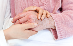 hand of the nurse and the patient